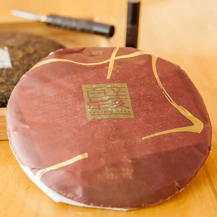 2011 Dayi / Menghai Tea Factory Xin Hai Bai Nian Ripe Pu-erh